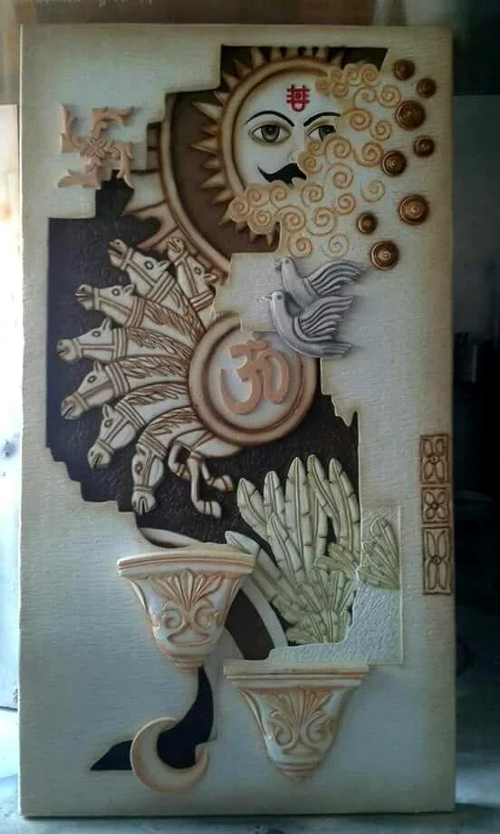 Ornate relief panel combining a peacock, an Om symbol and a decorative sun